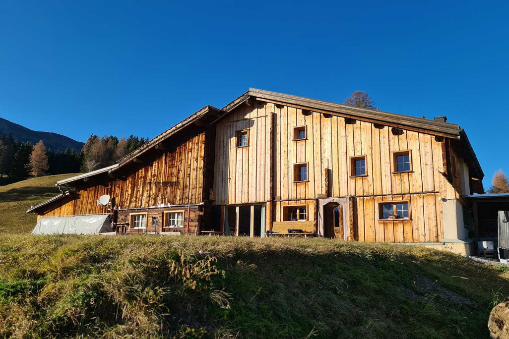 Mesure d'un bâtiment agricole dans les Grisons, HMQ AG